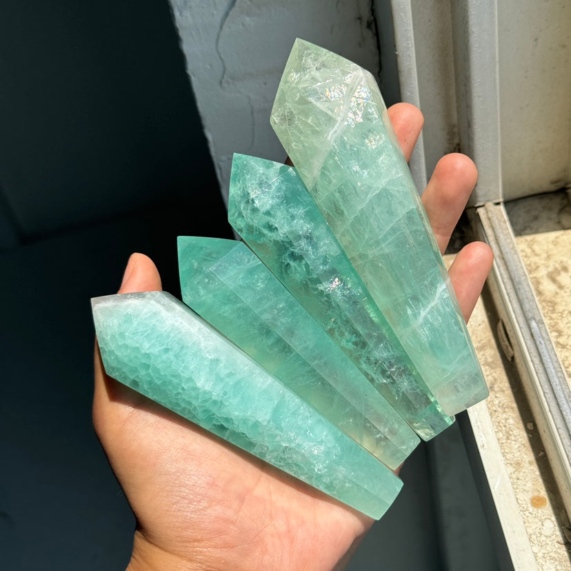 Baja Blast Fluorite Wand on stand – Simmon Crystal Wholesale